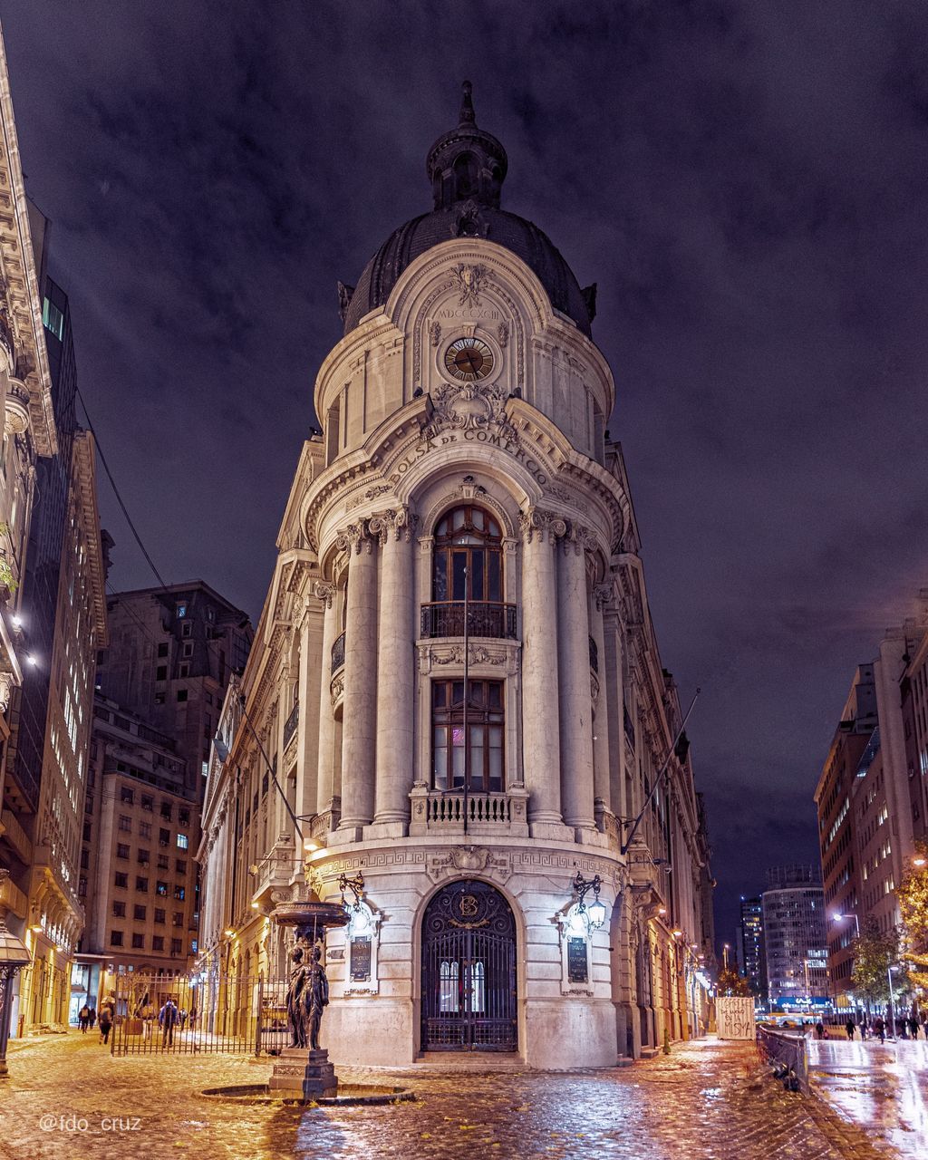 ILLUMINATED BUILDING AGAINST SKY AT NIGHT