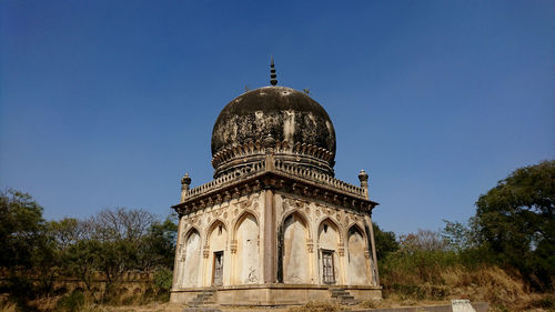 Low angle view of cathedral against blue sky