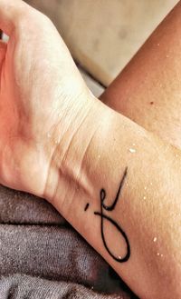 Close-up of hand with tattoo