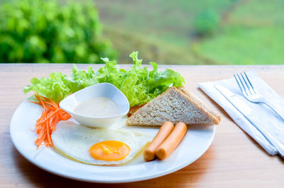 Close-up of breakfast served on table