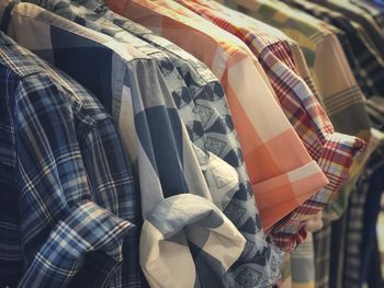 Close-up of clothes for sale in store