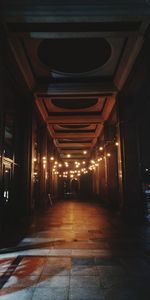 Illuminated corridor of building