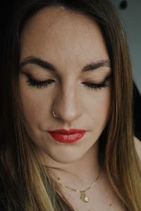 Close-up of beautiful young woman with make-up