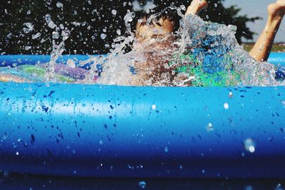Close-up of water drops on swimming pool
