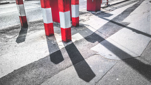 Detail shot of white lines on asphalt road