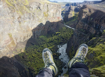 Low section of person on rocks