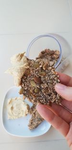 High angle view of person holding breakfast