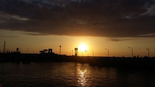 Silhouette of buildings at sunset