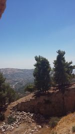 Scenic view of landscape against clear blue sky