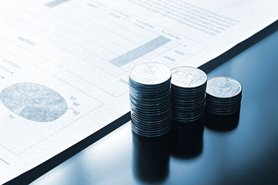 High angle view of coins on table