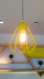 Low angle view of illuminated lamp