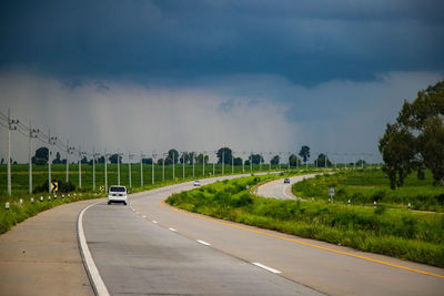 Empty road against sky