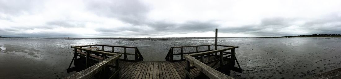 View of empty jetty along calm lake