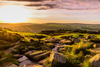 View of landscape against sky during sunset