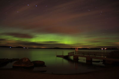 Scenic view of sea against sky at night