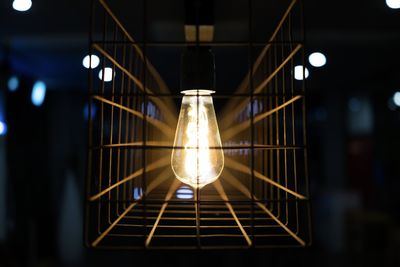 Low angle view of illuminated light bulb