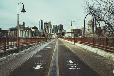 Street with information sign in city during winter