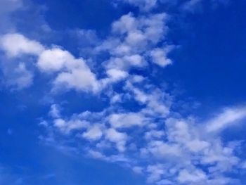 Low angle view of clouds in blue sky