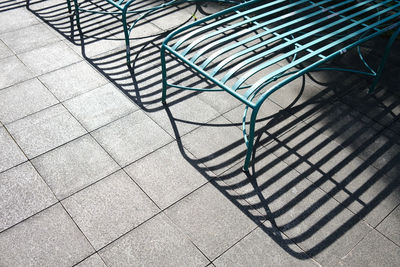 High angle view of green, empty chairs