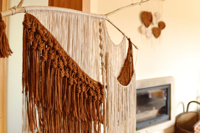 Close-up of textile hanging at home