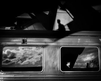 People seen through glass window
