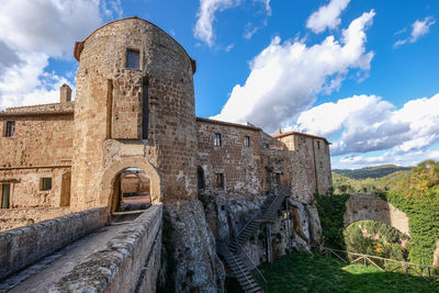 Low angle view of historic building against sky