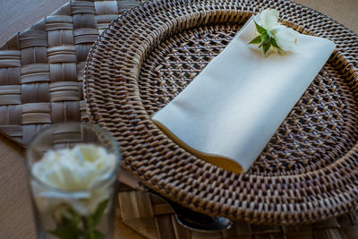 High angle view of wicker basket on table