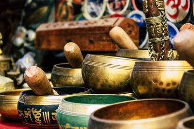 Close-up of old objects on table