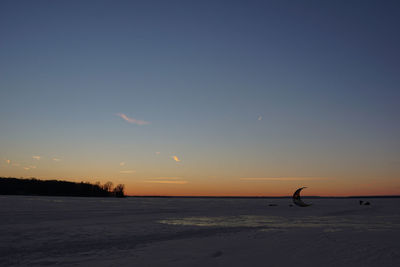 Scenic view of sea at sunset