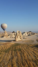 Scenic view of hot desert against clear sky