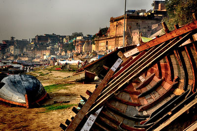 High angle view of buildings in city against sky