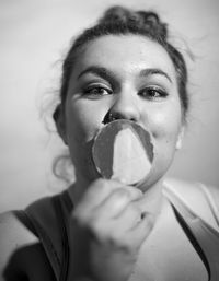 Portrait of woman holding ice cream