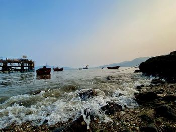 Scenic view of sea against clear sky