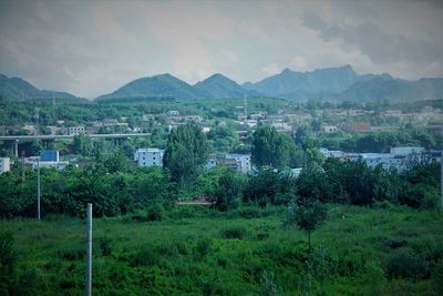 Scenic view of townscape against sky
