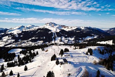 Scenic view of snowcapped mountains against sky