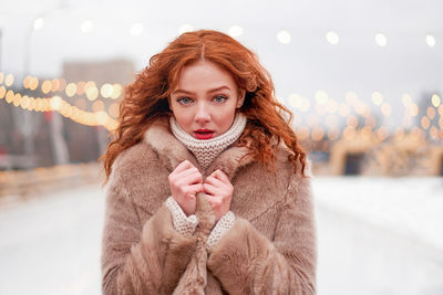 Portrait of woman in snow