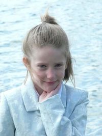 Portrait of cute girl in water