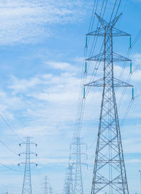 High voltage post, high voltage tower at blue sky background
