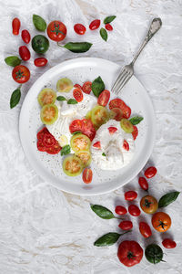 High angle view of fruits in bowl on table