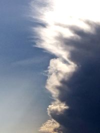 Low angle view of vapor trail in sky