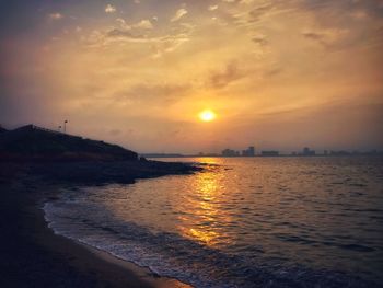 Scenic view of sea against sky during sunset