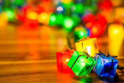 Close-up of illuminated christmas decorations on table