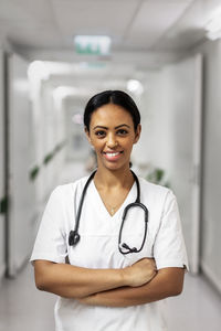 Female doctor looking at camera