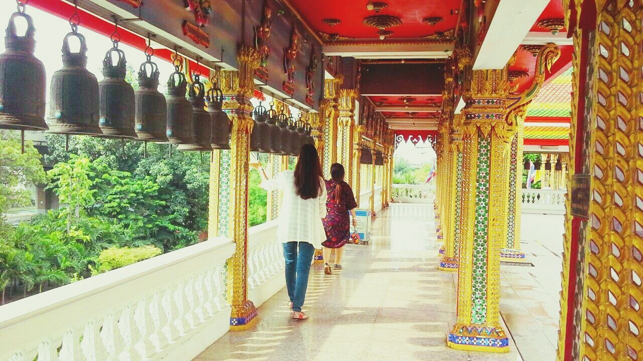 NARROW CORRIDOR ALONG WALLS AND MOSQUE