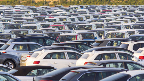Import of new cars for sale in a parking