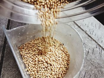 High angle view of rice in container