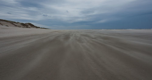 Scenic view of desert against sky