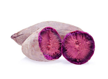 Close-up of fruit against white background