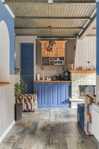 Blue interior of a village house with ethno decoration