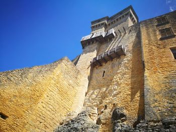 Low angle view of fort against sky